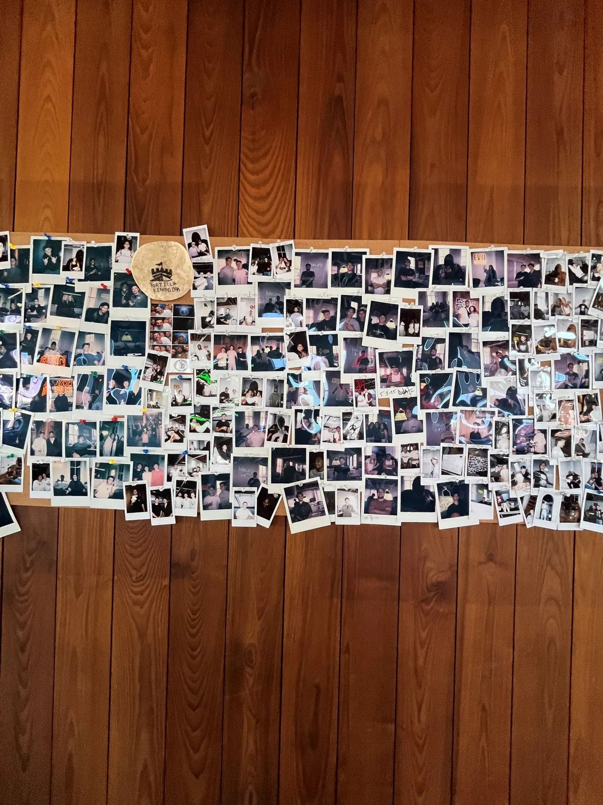 A wall of family photographs